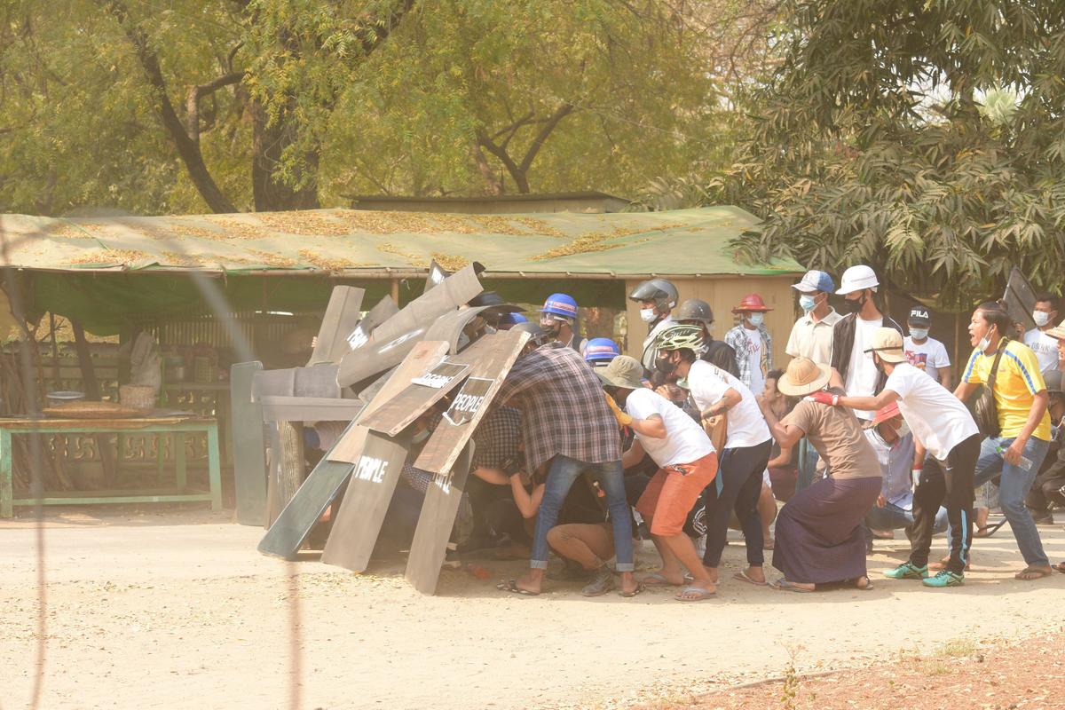 Unions Call for Total Strike in Burma; Suu Kyi Party Official Dies in Custody