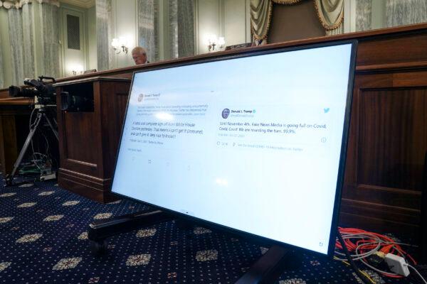 Tweets from President Donald Trump are displayed on a screen as Sen. Tammy Baldwin, D-Wis., not pictured, speaks during a hearing before the Senate Commerce Committee on Capitol Hill in Washington, on Oct. 28, 2020. (Greg Nash/Pool via AP, File)