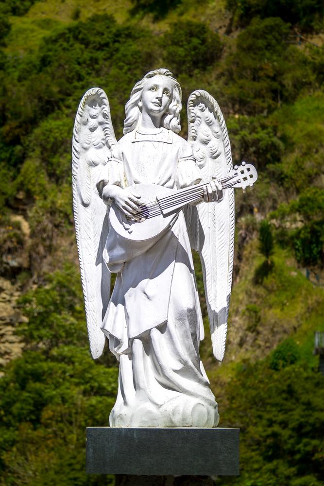 Angelic music greets visitors on the bridge to Las Lajas Shrine. (Diego Grandi/Shutterstock.com)