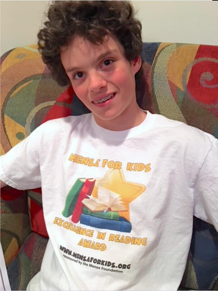 James with his MENSA Reading Challenge Award t-shirt, aged 12 or 13. (Courtesy of <a href="https://www.facebook.com/rosemary.laberee">Rosemary Ward Laberee</a>)