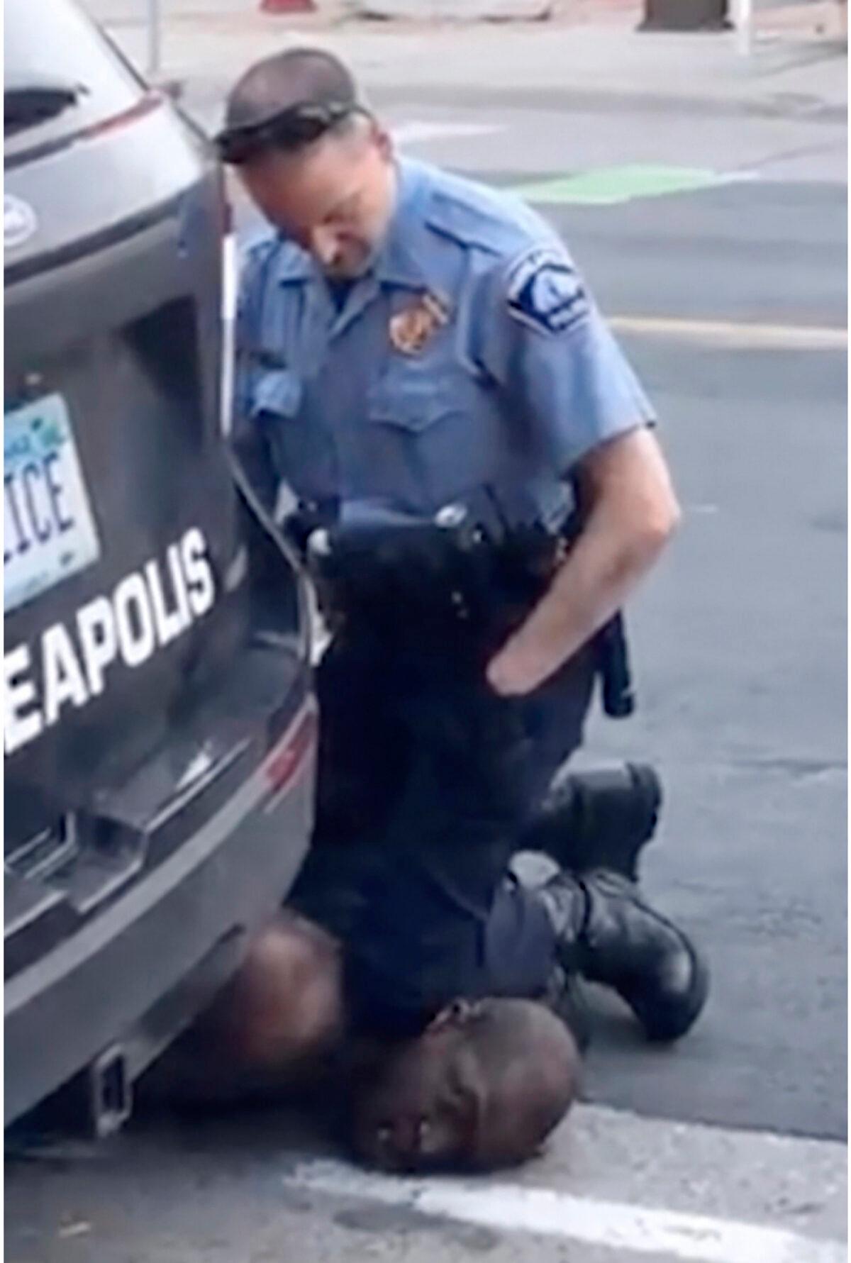 In an image from video, then-Minneapolis Police Officer Derek Chauvin kneels on the neck of George Floyd in Minneapolis, Minn., on May 25, 2020. (Darnella Frazier via AP)