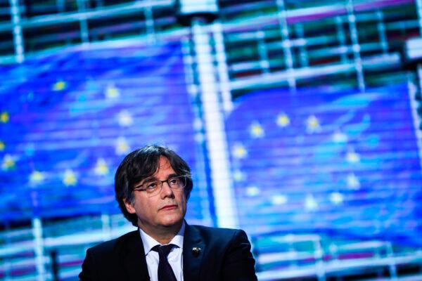 Member of European Parliament Carles Puigdemont prepares for an interview at the European Parliament in Brussels, on March 9, 2021. (Francisco Seco/AP Photo)