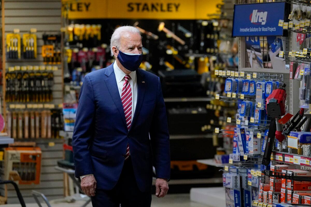 President Joe Biden visits W.S. Jenks & Son hardware store, a small business that received Paycheck Protection Program loans, in Washington on March 9, 2021. (Patrick Semansky/AP Photo)