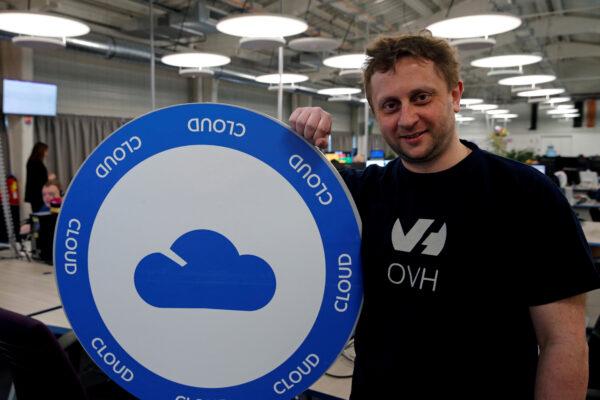Octave Klaba, founder and chief executive officer of OVH, poses near a company logo at the hotline service desk of French web-hosting and server provider OVH data center site in Roubaix, France, on April 5, 2018. (Pascal Rossignol/Reuters)