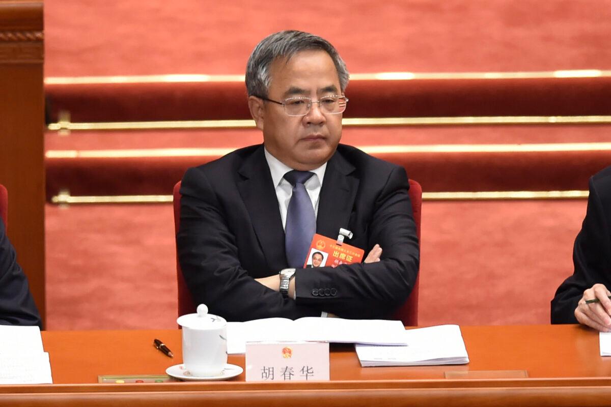 Chinese Vice Premier Hu Chunhua attends the opening session of the regime’s rubber-stamp legislature’s conference in Beijing on March 5, 2019. (Wang Zhao/AFP via Getty Images)