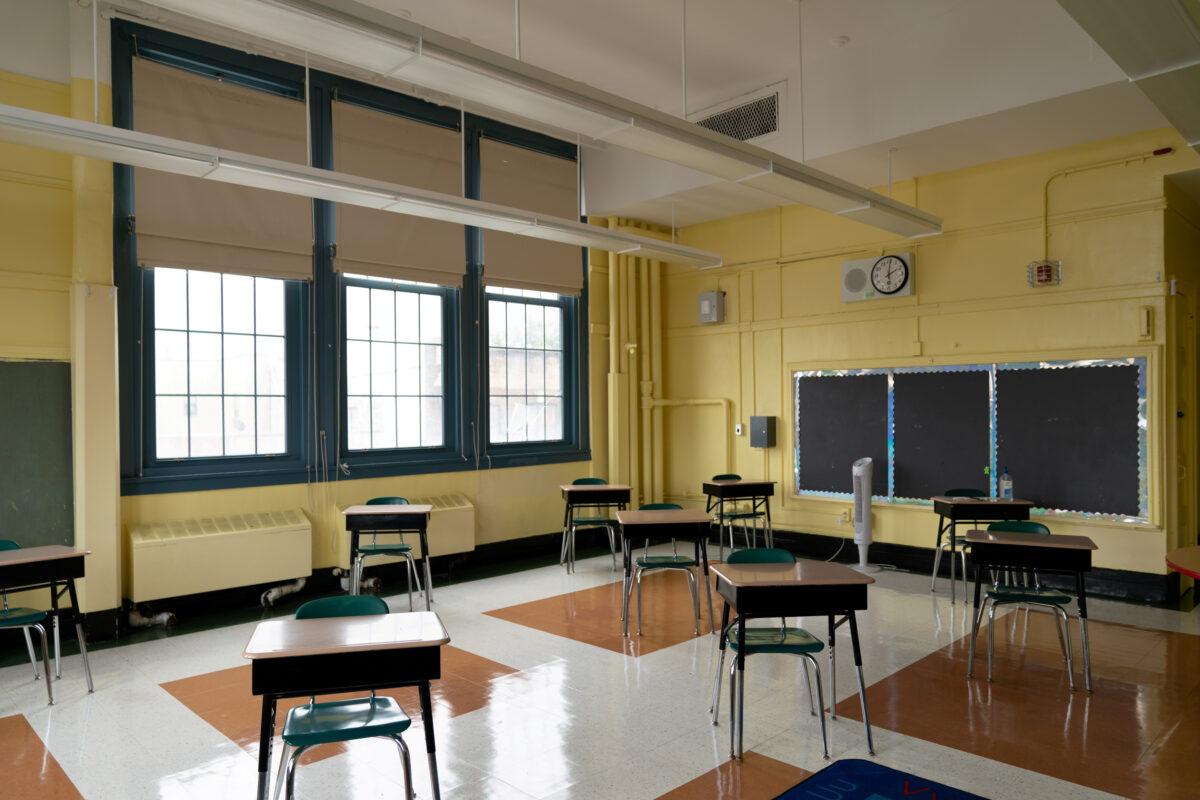 Students' desks adhere to social distancing requirements in a classroom during a news conference at New Bridges Elementary School, ahead of schools reopening, in the Brooklyn borough of New York City, on Aug. 19, 2020. (Jeenah Moon/Reuters)