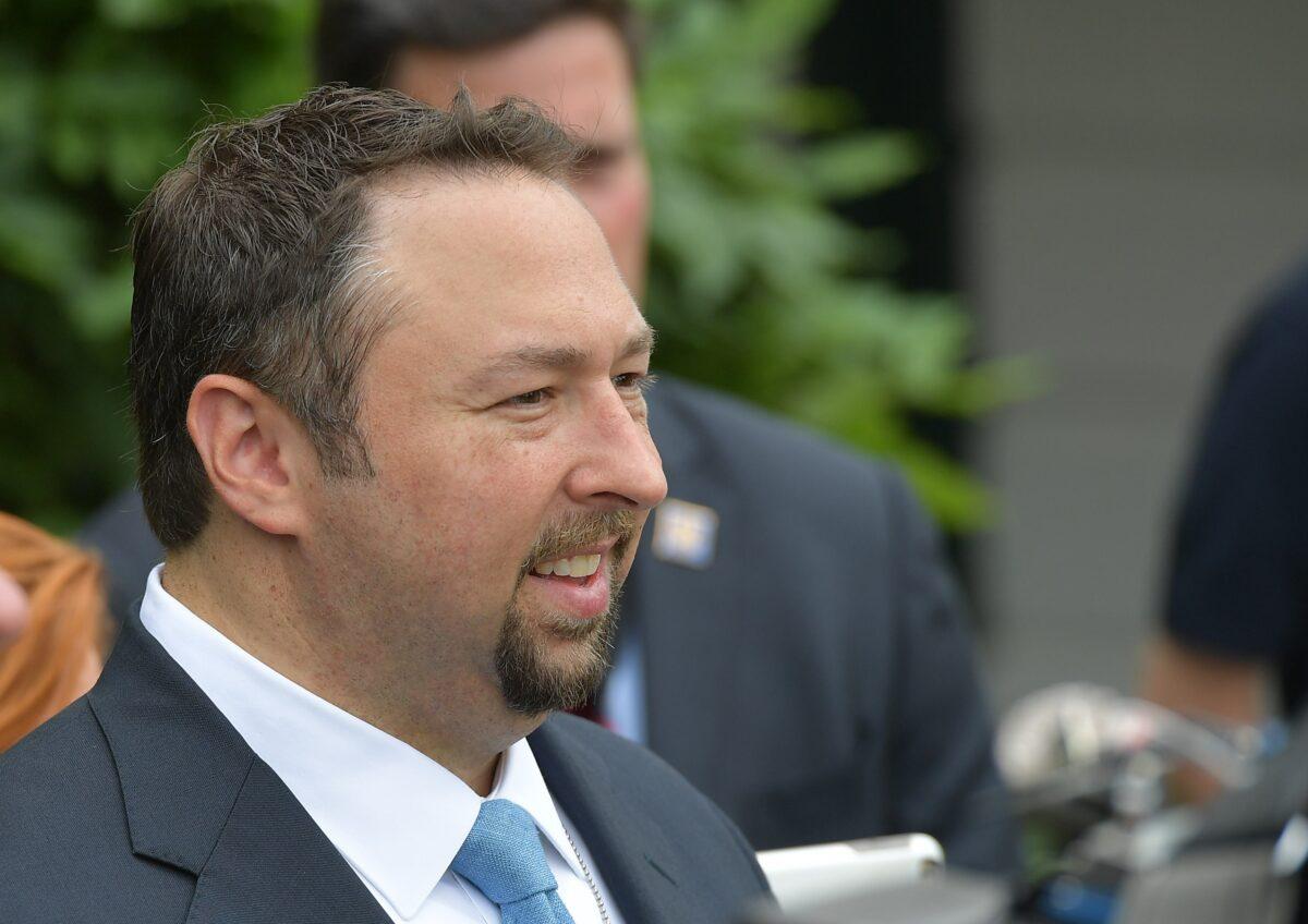 Jason Miller waits for the departure of then-President Donald Trump on Marine One from the South Lawn of the White House in Washington on June 17, 2017. (Mandel Ngan/AFP via Getty Images)