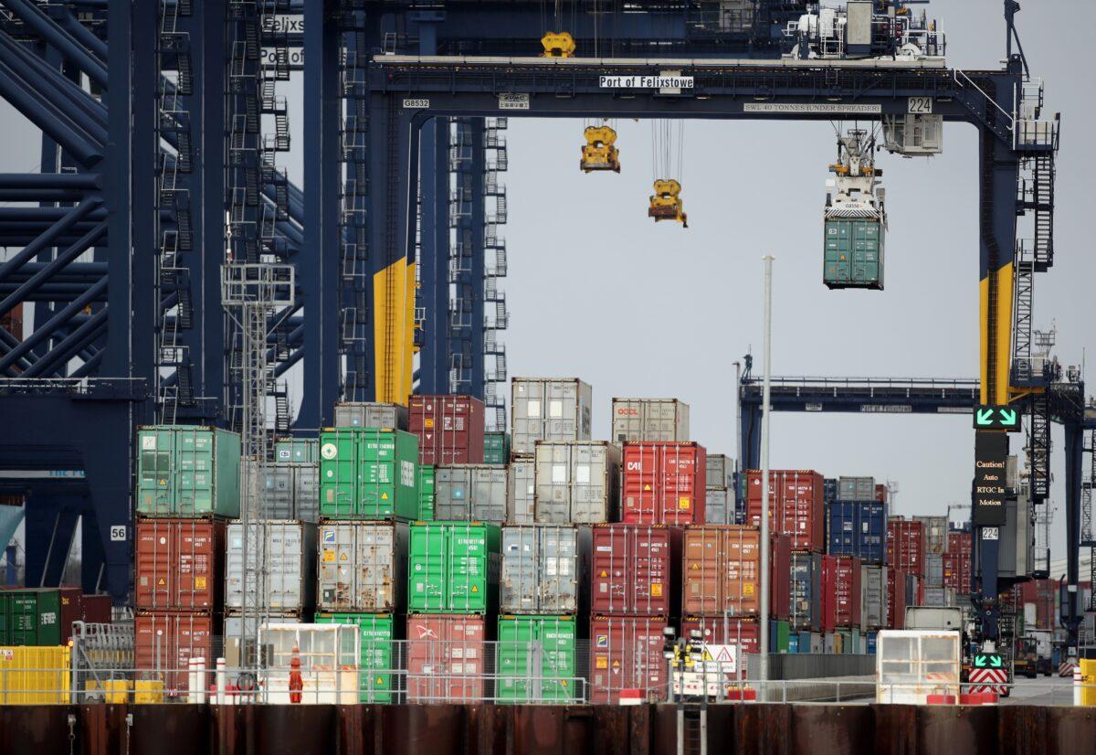 Containers are stacked at the Port of Felixstowe, Britain, on Jan. 28, 2021. (Peter Cziborra/Reuters)