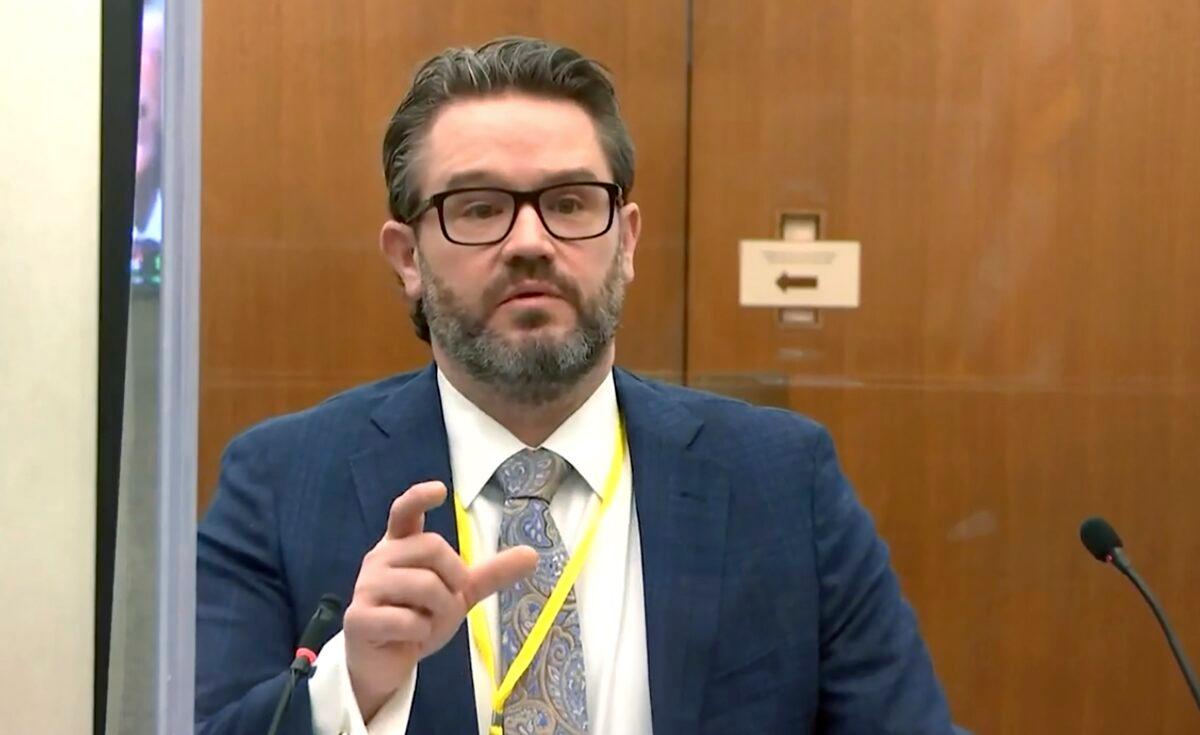 Defense attorney Eric Nelson speaks to Hennepin County Judge Peter Cahill during pretrial motions, prior to continuing jury selection in the trial of former Minneapolis police officer Derek Chauvin, at the Hennepin County Courthouse in Minneapolis, Minn., on March 11, 2021. (Court TV/Pool via Pool)