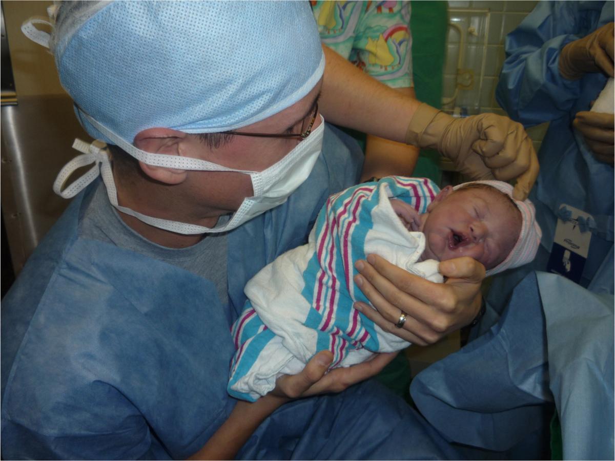 Chad Judice holding his newborn baby son Eli. (Courtesy of <a href="https://www.chadjudice.com/about">Chad Judice</a>)