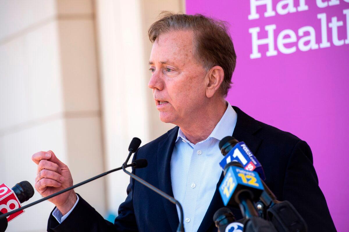 Connecticut Governor Edward Miner "Ned" Lamont Jr., a Democrat, speaks about the state's efforts to get more people vaccinated at Hartford HealthCare St. Vincent's Medical Center in Bridgeport, Conn., on Feb. 26, 2021. (Joseph Prezioso/AFP via Getty Images)