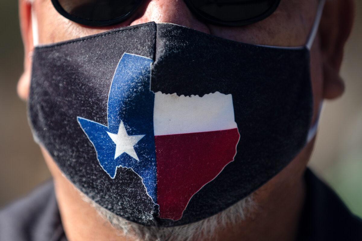 San Jose Hotel engineering manager Rocky Ontiveros wears a Texas themed mask in Austin, Texas, on March 3, 2021. (Montinique Monroe/Getty Images)