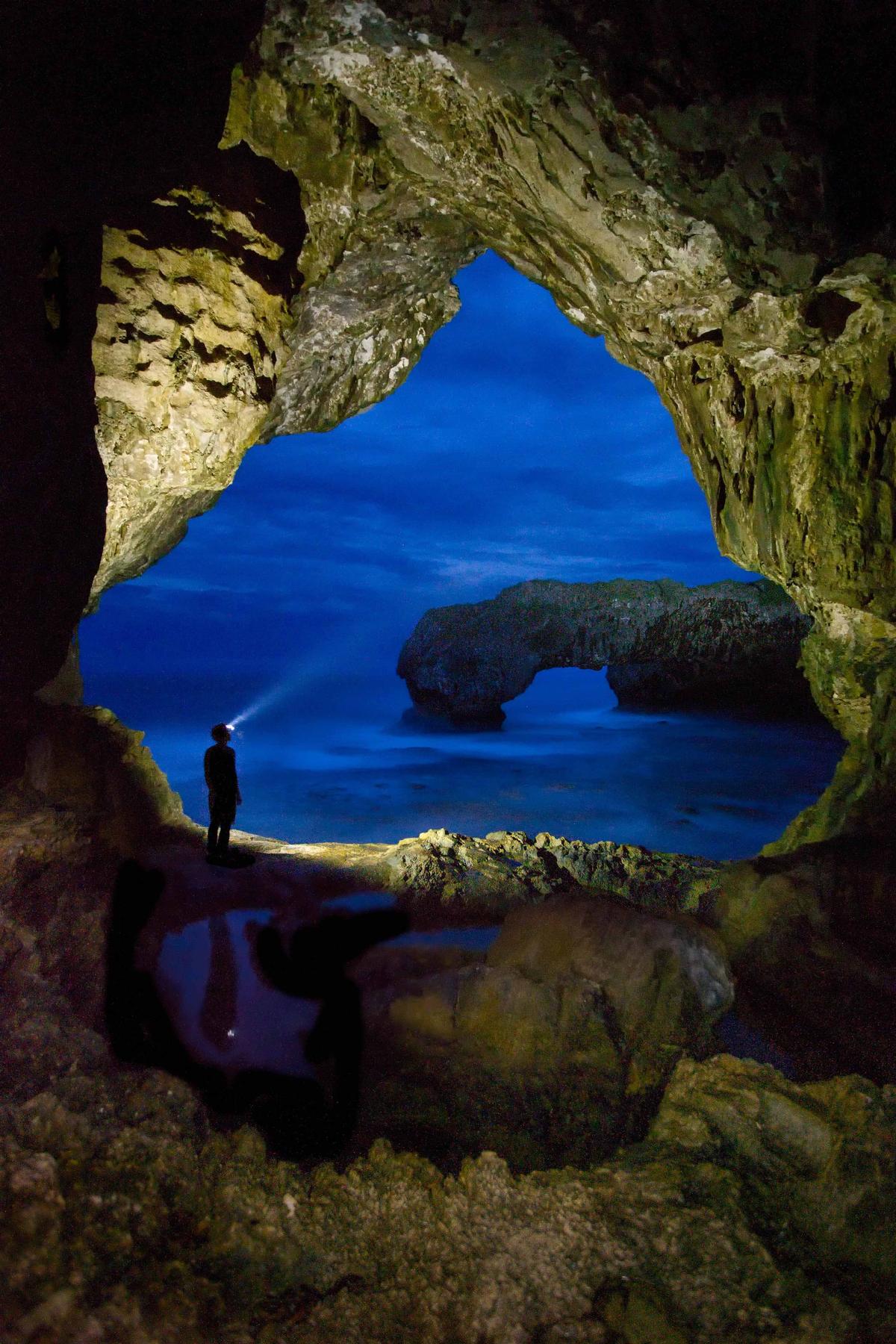 A self-portrait of Paul Zizka at Talava Arches, Niue (Caters News)
