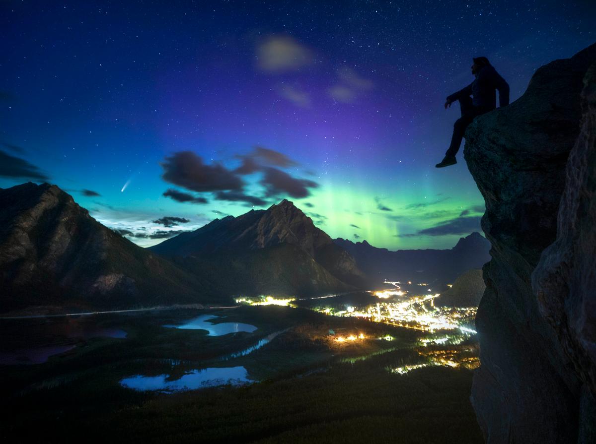 A self-portrait of Paul Zizka watching Comet Neowise in Banff, Canada (Caters News)