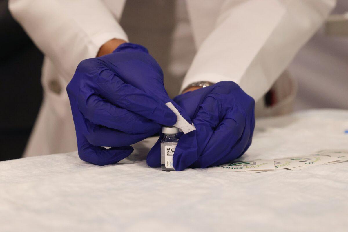 A medical worker at South Shore University Hospital administers the newly available Johnson & Johnson COVID-19 vaccine in Bay Shore, N.Y., on March 3, 2021. (Spencer Platt/Getty Images)