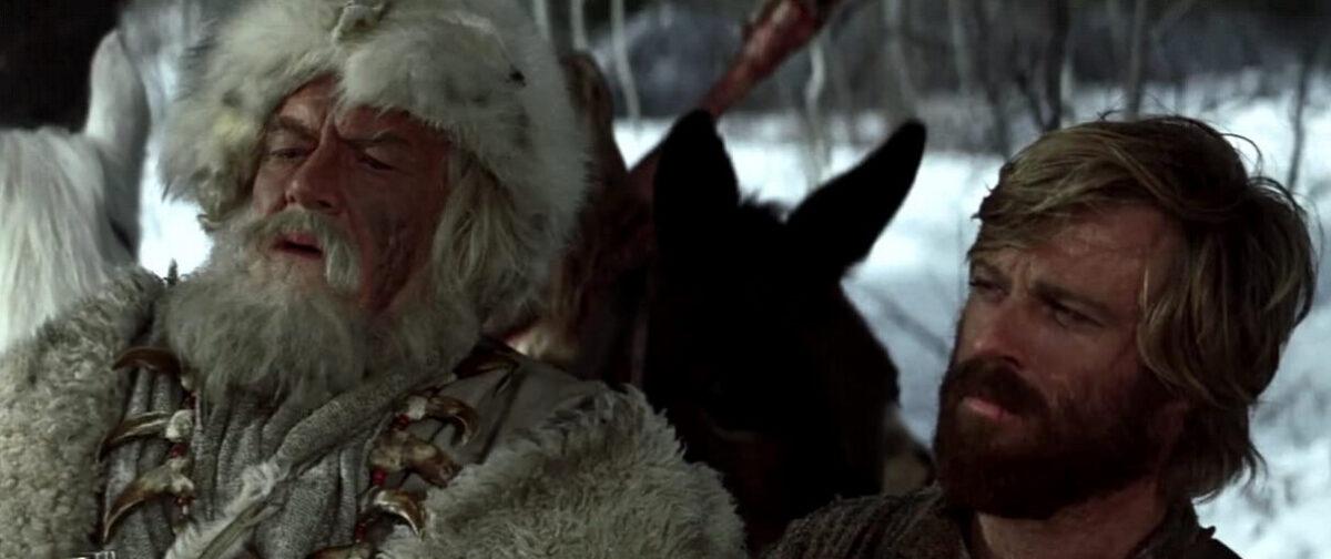 Bear Claw (Will Geer, L) and Jeremiah Johnson (Robert Redford), in "Jeremiah Johnson." (Warner Bros.)