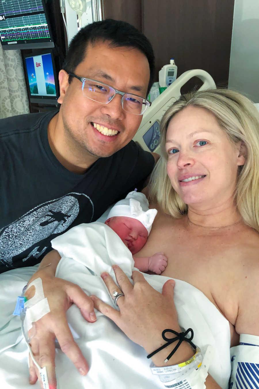 Paul Kim and Tiffany Kim with their newborn daughter, Arabella. (Courtesy of <a href="https://www.instagram.com/abellamiracle/">Abellamiracle</a>)