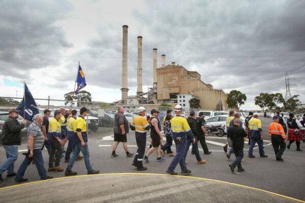 Workers leave Hazelwood Power Station after their final shift in Hazelwood, Australia on Mar. 31, 2017. Around 750 workers have been left jobless after the plant was closed. (Scott Barbour/Getty Images)