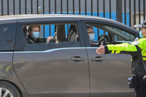 Members of the World Health Organization (WHO) team investigating the origins of the COVID-19 coronavirus, leave the Wuhan Institute of Virology in Wuhan, China, on Feb. 3, 2021. (Hector Retamal /AFP via Getty Images)
