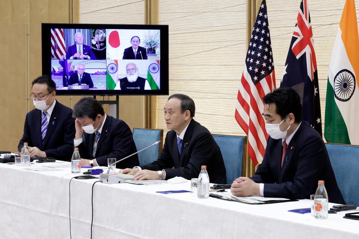 Japanese Prime Minister Yoshihide Suga (2nd R) speaks during the virtual summit of the leaders of Australia, India, Japan, and the United States, a group known as “the Quad," at his official residence in Tokyo, on March 12, 2021. (Kiyoshi Ota/Pool via AP)