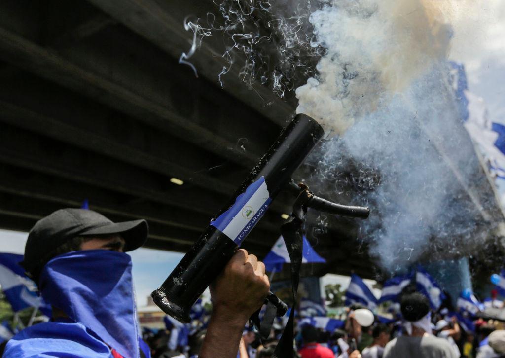 A man fires a homemade mortar during a protest against Nicaraguan President Daniel Ortega on Sept. 15, 2018. (Inti Ocon/AFP via Getty Images)