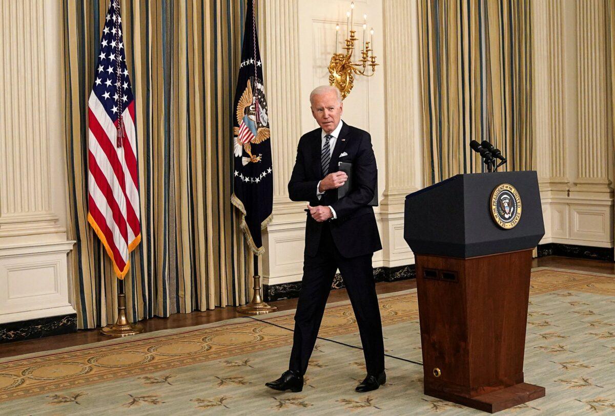 President Joe Biden departs after speaking in the State Dining Room at the White House in Washington on March 15, 2021. (Kevin Lamarque/Reuters)