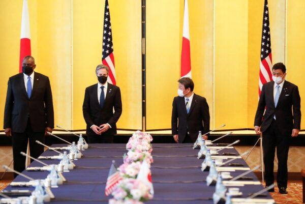 Secretary of State Antony Blinken, U.S. Defense Secretary Lloyd Austin, Japan's Foreign Minister Toshimitsu Motegi and Japan's Defence Minister Nobuo Kishi attend the 2+2 Meeting at Iikura Guest House in Tokyo, Japan, on March 16, 2021. (Kim Kyung-Hoon/Pool/Reuters)