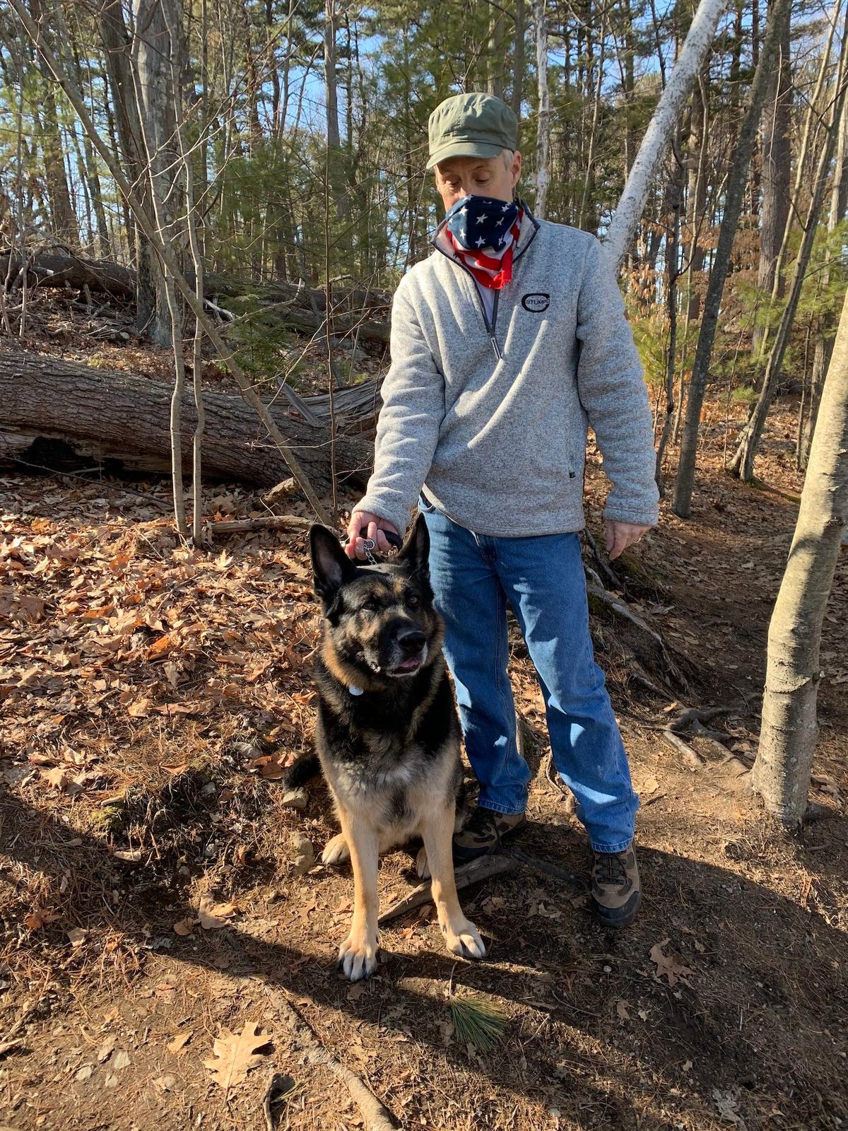 Thomas Walsh and his 5-year-old German shepherd, Diesel, helped rescue a man struggling in Quarter Mile Pond on the Stoneham and Medford town line. (Courtesy of <a href="https://stonehamfire.com/2021/03/10/stoneham-fire-department-responds-after-man-falls-through-ice-at-quarter-mile-pond/">Stoneham Fire Department</a>)