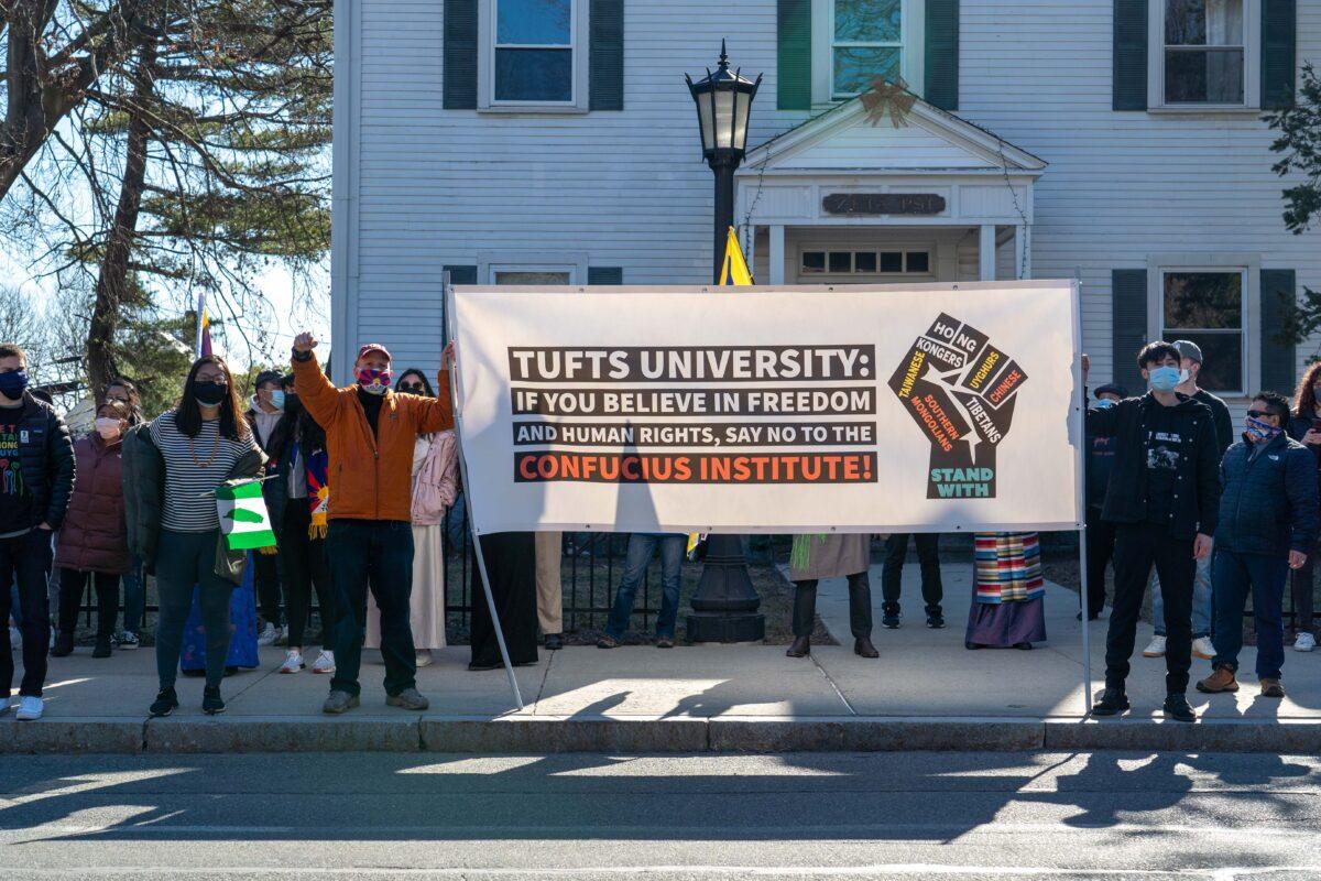 A human rights group urges Tufts University to close its Confucius Institute in Somerville, Mass., on March 13, 2021. (Learner Liu/The Epoch Times)