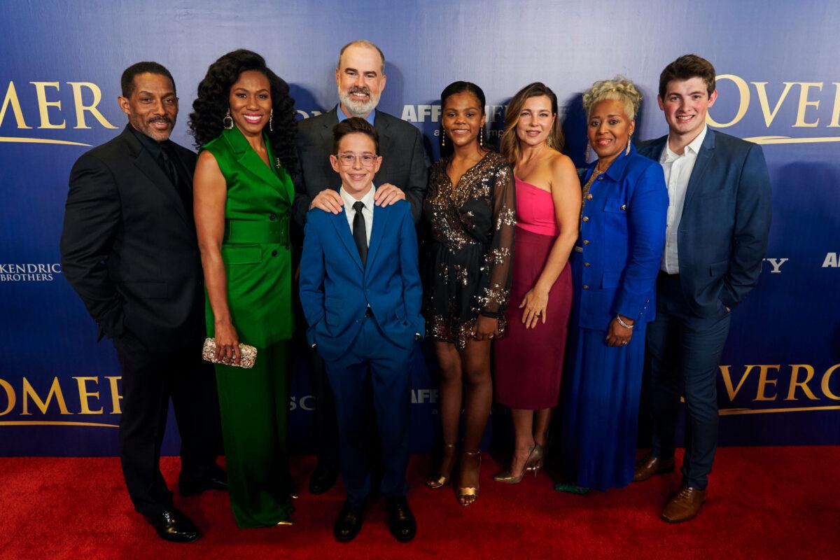 (L-R) The cast and director of "Overcomer" Cameron Arnett, Priscilla Shirer, Alex Kendrick, Caleb Kendrick, Aryn Wright-Thompson, Shari Rigby, Denise Armstrong and Jack Sterner pose for a photo at AMC North Park 15 in Dallas, Texas, on Aug. 13, 2019. (Cooper Neill/Getty Images for AFFIRM Films A Sony Company)