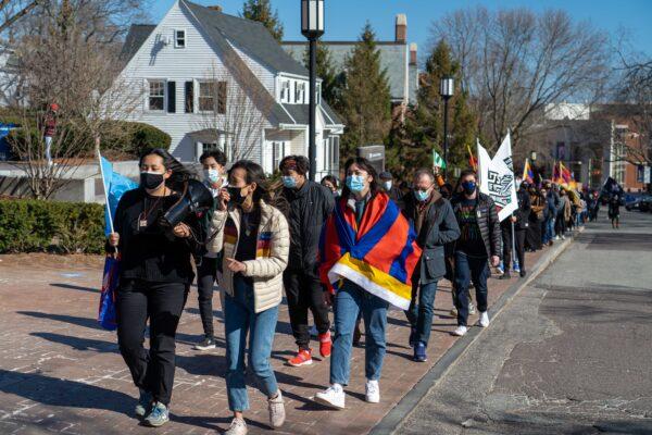 Protesters march through Tufts University against a Confucius Institute in Somerville, Mass., on March 13, 2021. (Learner Liu/The Epoch Times)