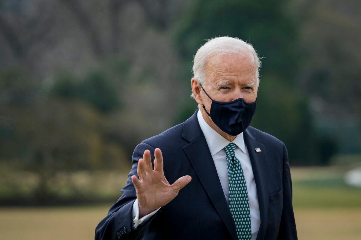 U.S. President Joe Biden walks to the Oval Office after exiting Marine One on the South Lawn of the White House in Washington on March 17, 2021. (Drew Angerer/Getty Images)