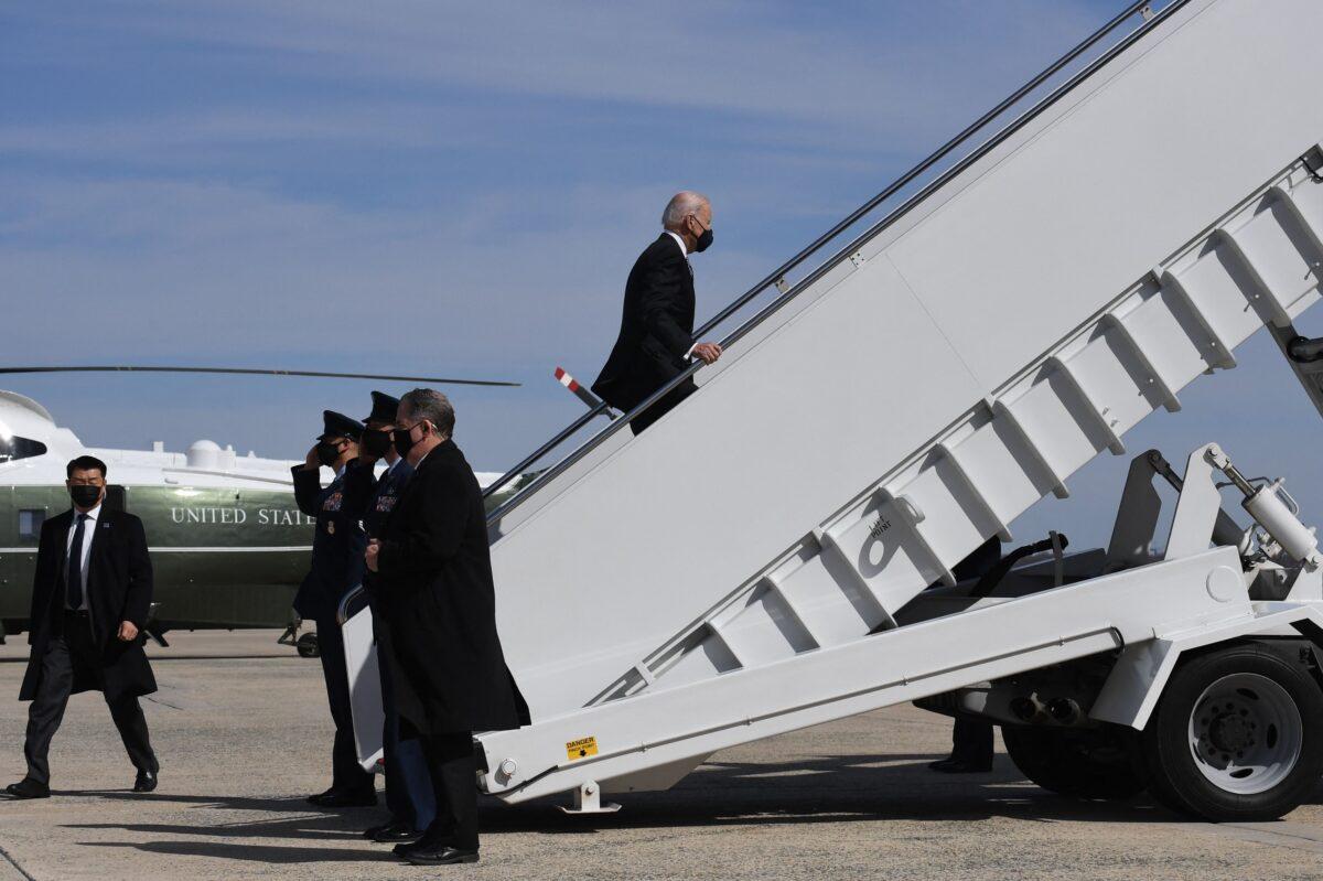 President Joe Biden boards Air Force One at Joint Base Andrews in Maryland on March 19, 2021. (Eric Baradat/AFP via Getty Images)