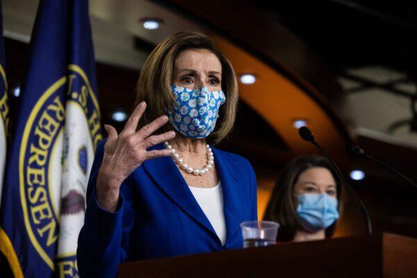 House Speaker Nancy Pelosi (D-Calif.) speaks to reporters on Capitol Hill in Washington on March 19, 2021. (Graeme Jennings/Pool/AFP via Getty Images)