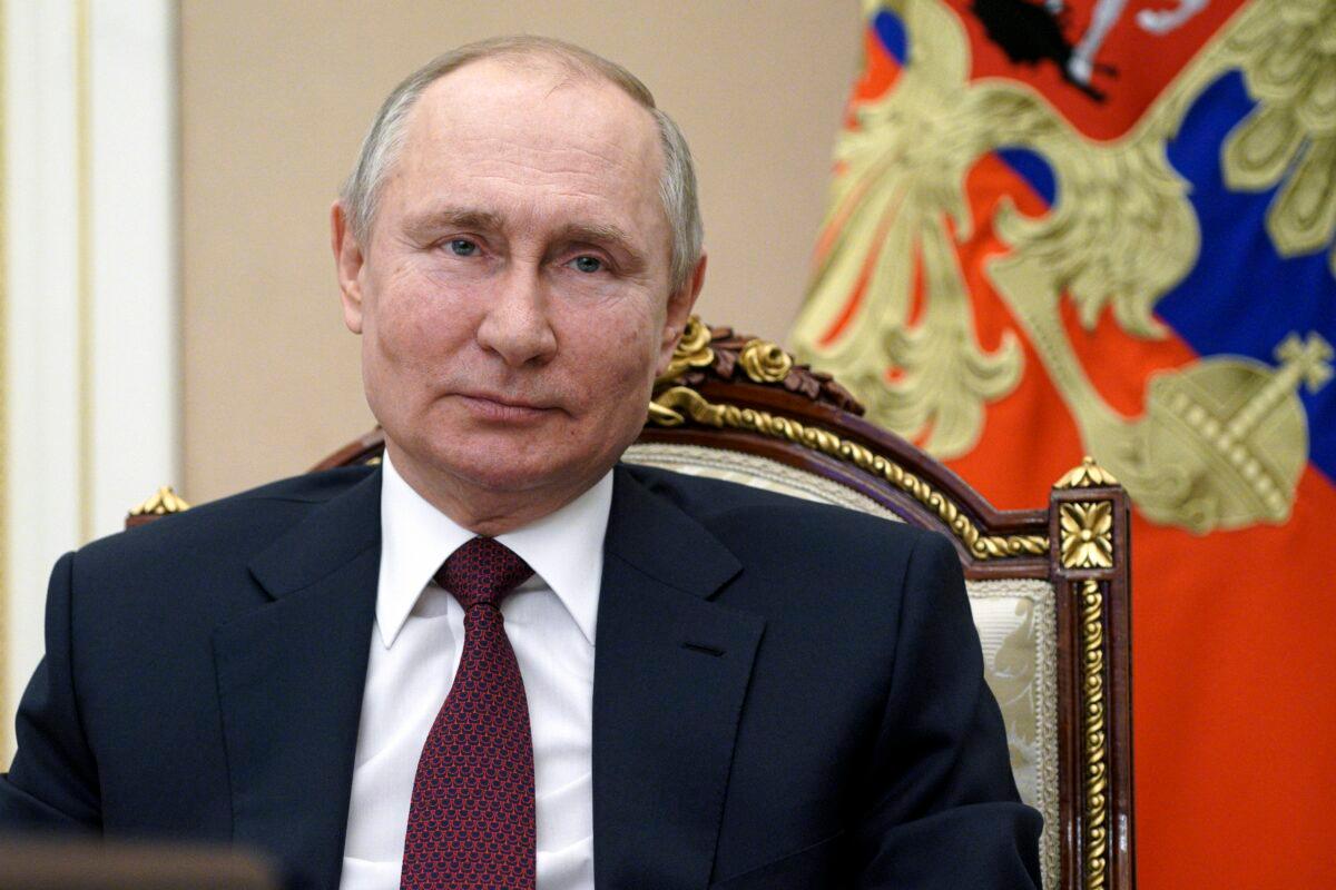 Russian President Vladimir Putin attends a meeting on social and economic development of Crimea and Sevastopol, via video conference in Moscow, Russia, on March 18, 2021. (Sputnik, Kremlin Pool Photo via AP)
