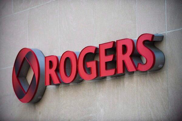 The Rogers Communications sign marks the company's headquarters in Toronto, Canada, on April 25, 2012. (Aaron Vincent Elkaim/The Canadian Press)