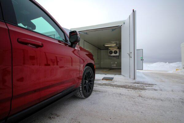 Moving an Escalade into a cold cell. (Courtesy of General Motors)