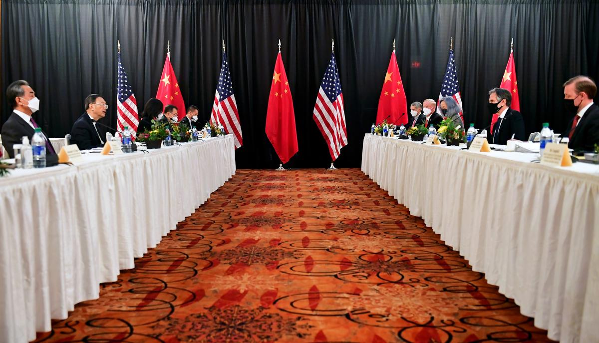 U.S. Secretary of State Antony Blinken (2nd R), joined by National Security Advisor Jake Sullivan (R), speaks while facing Yang Jiechi (2nd L), director of the Central Foreign Affairs Commission Office, and Wang Yi (L), China's state councilor and foreign minister, at the opening session of U.S.-China talks at the Captain Cook Hotel in Anchorage, Alaska, on March 18, 2021. (Frederic J. Brown/Pool via Reuters)