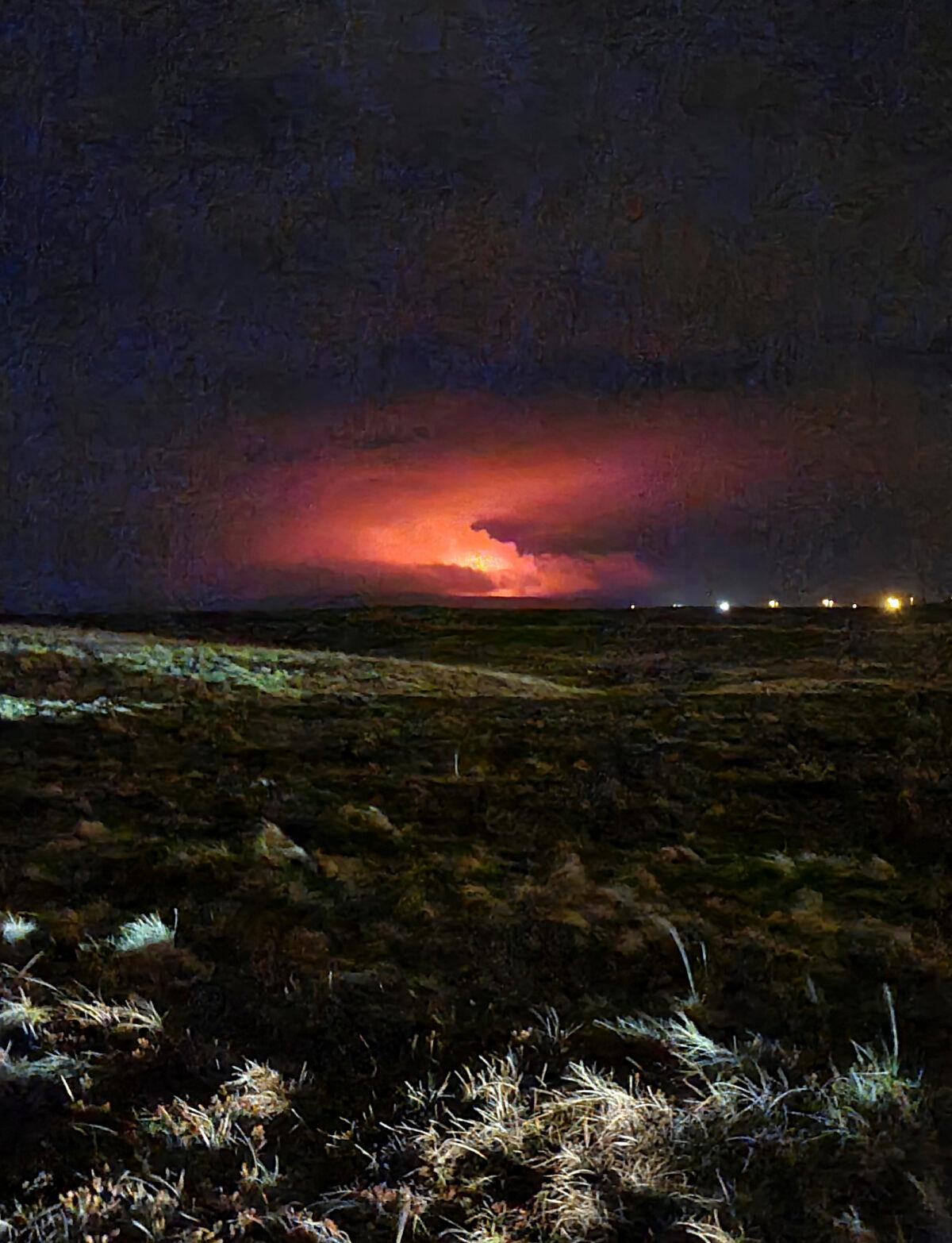 The night sky glows following the eruption of a volcano on Reykjanes Peninsula not far from the capital Reykjavik, Iceland, on March 19, 2021. (Hildur Hlín Jónsdóttir via AP)