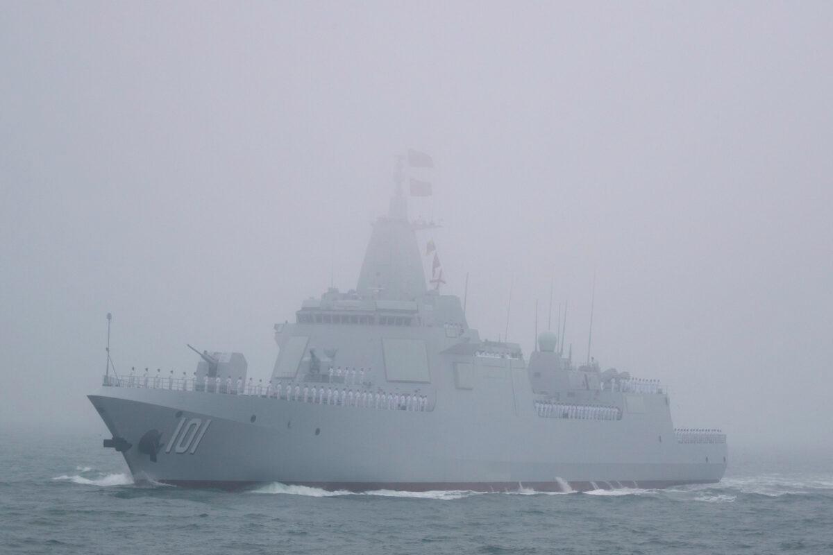 China’s Type 055 missile destroyer Nanchang participates in a naval parade in the sea near Qingdao, eastern China's Shandong Province on April 23, 2019. (MARK SCHIEFELBEIN/AFP via Getty Images)