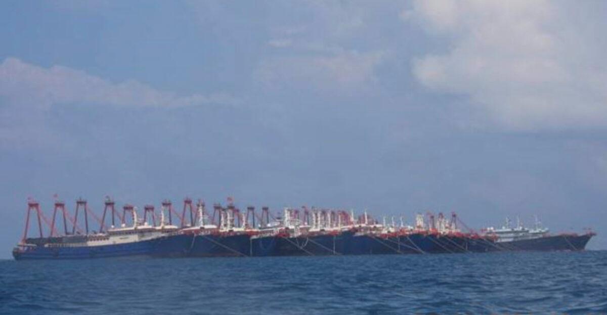 Some of the 220 Chinese vessels are seen moored at Whitsun Reef, South China Sea, on March 7, 2021. The Philippine government expressed concern after spotting more than 200 Chinese fishing vessels it believed were crewed by militias at a reef claimed by both countries in the South China Sea, but it did not immediately lodge a protest. (Philippine Coast Guard/National Task Force-West Philippine Sea via AP)