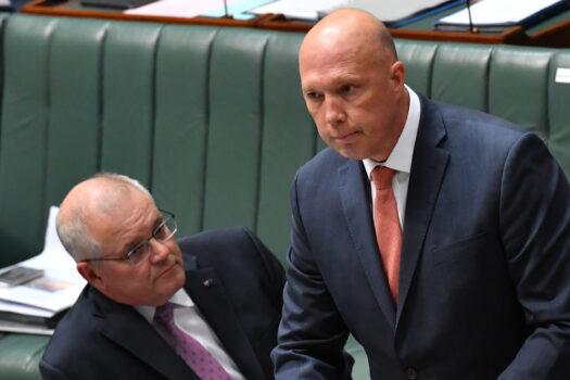 Prime Minister Scott Morrison (L) and Minister for Home Affairs Peter Dutton look on during Question Time in the House of Representatives at Parliament House in Canberra, Australia on March 15, 2021. (Sam Mooy/Getty Images)