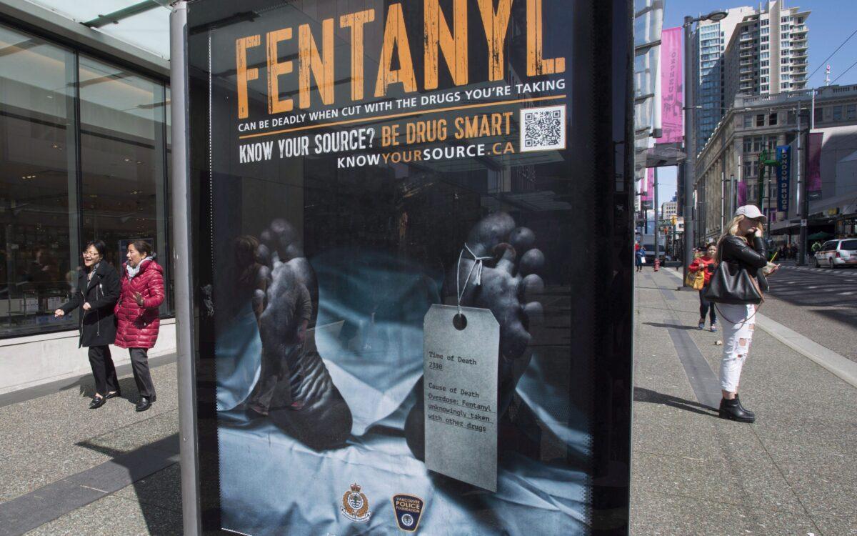 An anti-fentanyl advertisement is seen on a sidewalk in downtown Vancouver on April 11, 2017. (The Canadian Press/Jonathan Hayward)