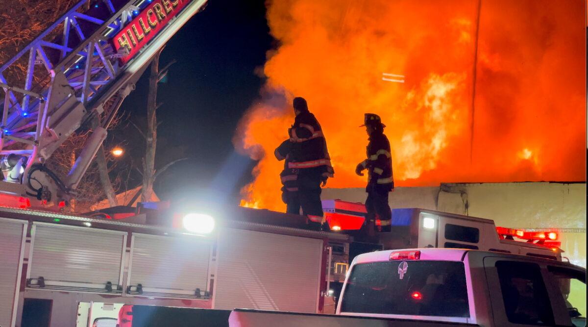 Firefighters work at a site of a fire that broke out at Evergreen Nursing Home in Spring Valley, N.Y., on March 23, 2021. (Screenshot/Benny Polatseck via Reuters)