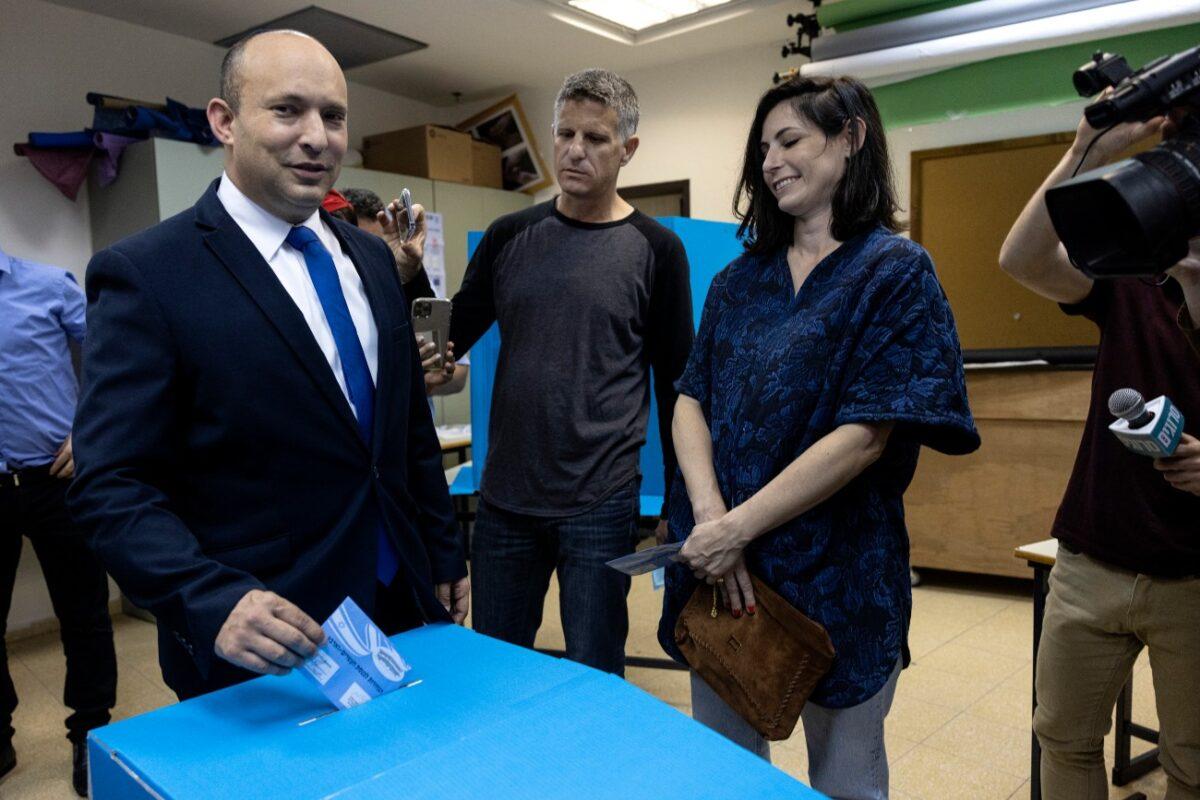 Israeli politician Naftali Bennett, leader of the right wing 'New Right' party, and his wife Gilat vote in the city of Raanana, Israel, on March 23, 2021. (Tsafrir Abayov/AP Photo)