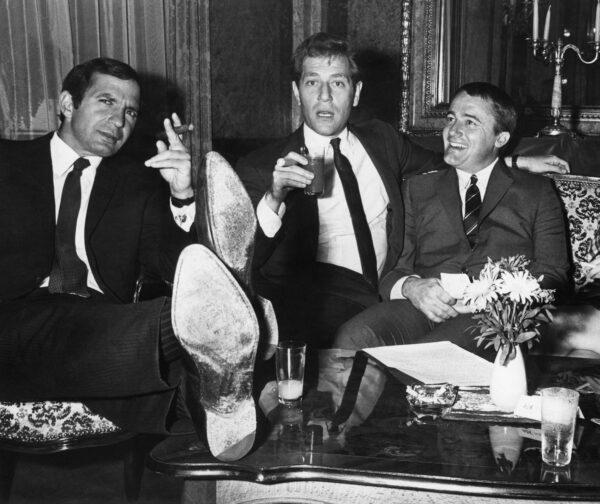  Actors left to right, Ben Gazzara, George Segal and Robert Vaughn, stars of film "The Bridge at Remagen" relax during press conference at Imperial Hotel in Vienna, on Aug. 2, 1968. (AP Photo)