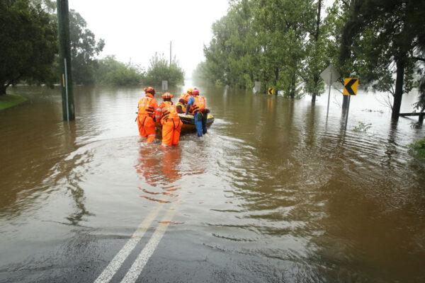 SES workers launch their rescue craft into the flooded Hawkesbury river along Inalls lane in Richmond in Sydney, Australia on March 23, 2021. (Mark Kolbe/Getty Images)