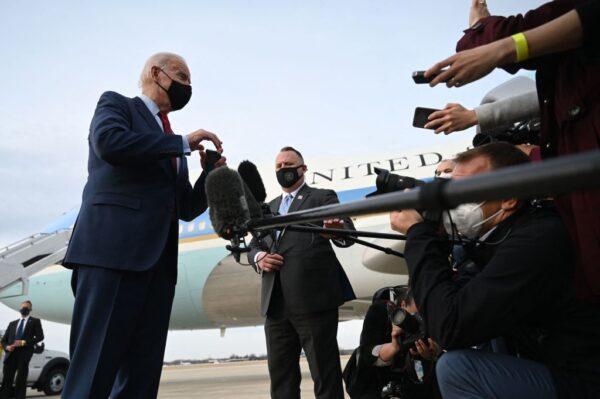 President Joe Biden speaks to the press before boarding Air Force One in Columbus, Ohio on March 23, 2021. (Jim Watson/AFP via Getty Images)