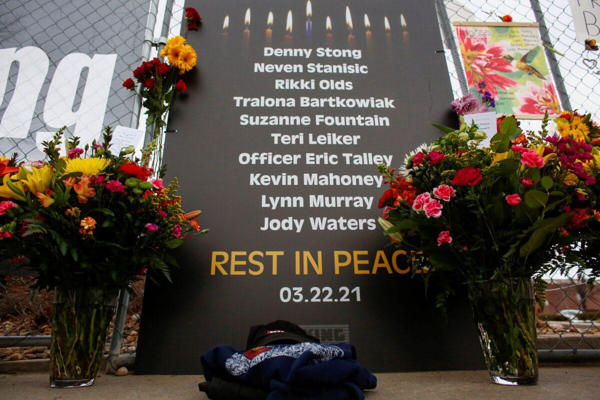 A sign honoring the 10 victims is seen at the site of a mass shooting at a King Soopers grocery store in Boulder, Colo., on March 23, 2021. (Kevin Mohatt/Reuters)