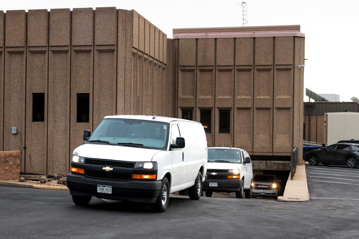 Law enforcement vehicles believed to be transporting King Soopers shooting suspect Ahmad Al Aliwi Alissa from the Boulder County Justice Center after making his first court appearance in Boulder, Colo., on March 25, 2021. (Michael Ciaglo/Getty Images)